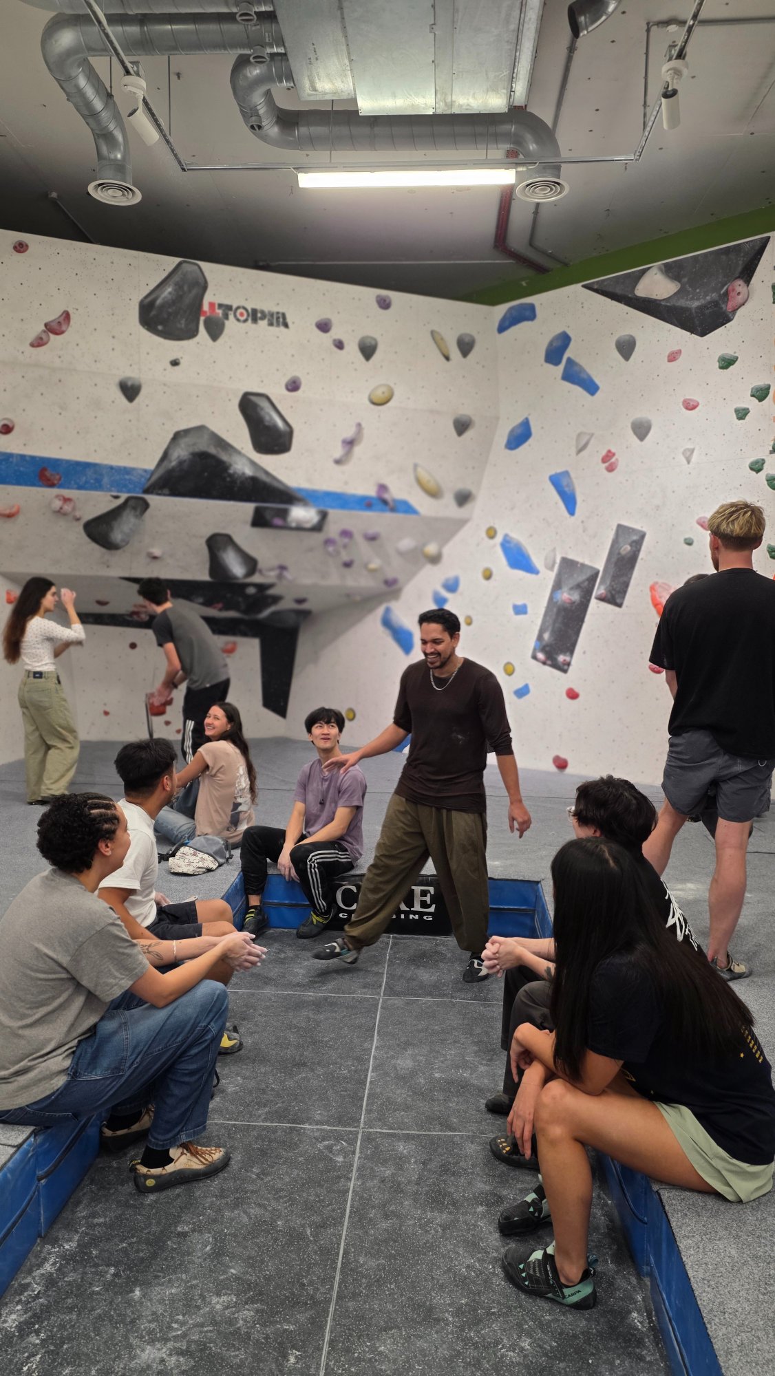 In person coaching session at the climbing gym