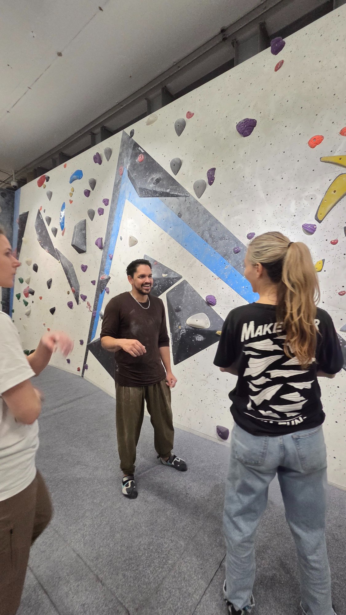 Kamran coaching and chatting with students